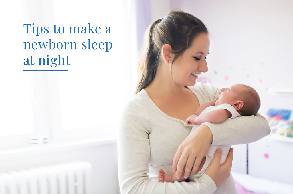 Mom comforting her infant in a soft and calm environment for a Pizuna baby sleep guide